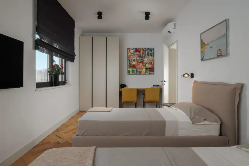 Slaapkamer met tv in Villa BB
